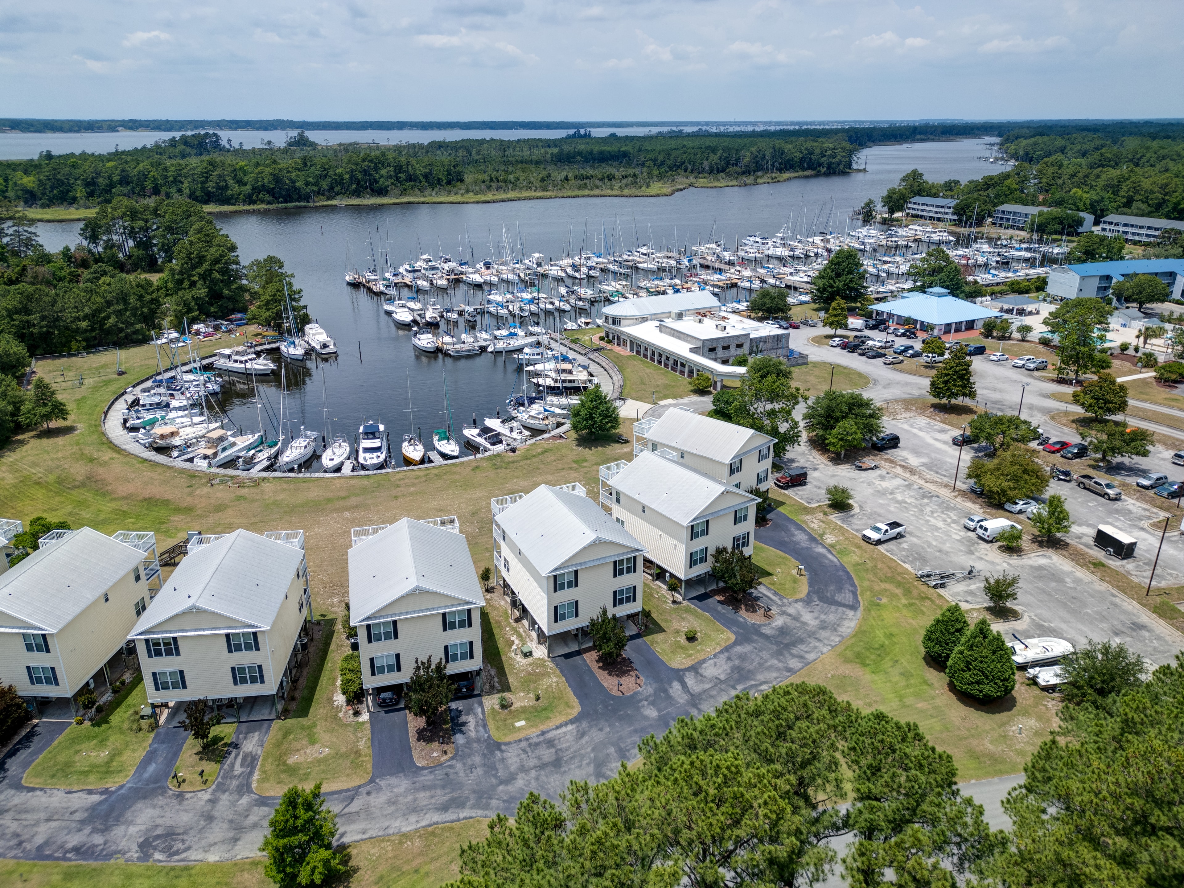 Aerial view of Marina Townes townhouses with the marina behind them